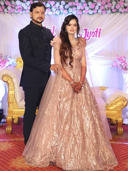 A dreamy golden gown for a bride-to-be. This sparkling dress is a perfect rental for an engagement or reception, giving you a high-end look on a budget.