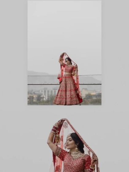 A minimalist and artistic portrait of the bride holding her veil against a clean, grey sky.