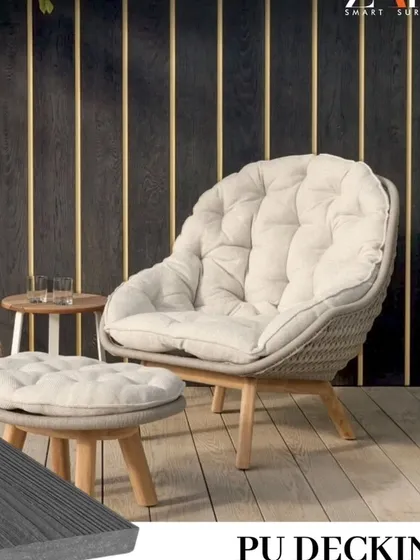 This image shows how my dark grey PU decking can be used to create a sophisticated and modern patio space. The texture provides a natural wood feel.