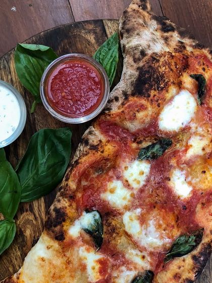 Our calzone is stuffed with cheese, topped with more sauce and cheese, and wrapped in a sourdough crust. You can customize it with any of our fresh ingredients.