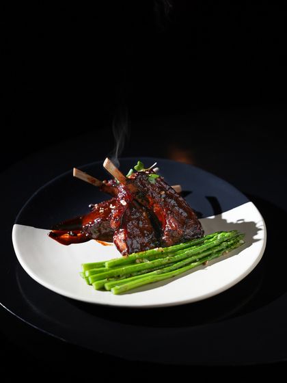 Redefining meals with our succulent New Zealand Lamb Chops. Perfectly cooked and glazed, served with crisp asparagus, these chops offer a taste of heaven.