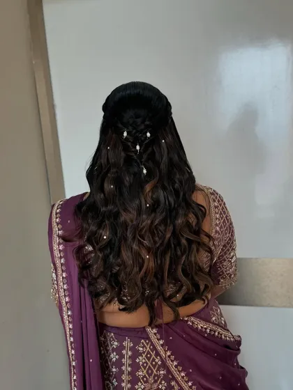 The back view of this pretty and practical hairstyle, perfect for a long day of wedding festivities.