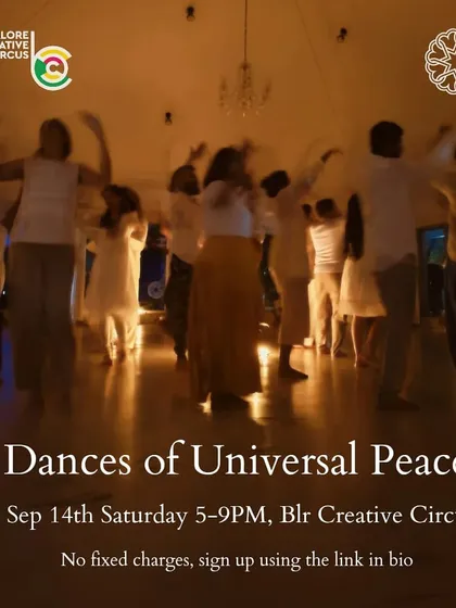 A beautiful, ethereal shot of our Dances of Universal Peace session. Participants dressed in white move together in a meditative circle, creating a powerful experience of unity and harmony.