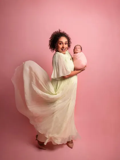 A fun, candid shot of Pearle, full of life and happiness. Her flowing dress and bright smile perfectly capture her personality.