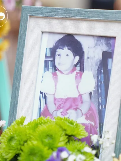 A framed childhood photo adds a sweet, nostalgic element to the decor, connecting the past with the future.