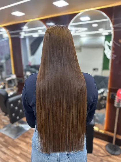 The back view shows just how long, healthy, and beautifully colored the hair is.