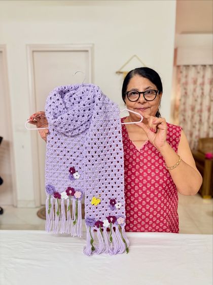 Another look at the pretty lavender scarf. Handmade art is costly, not expensive, because it includes hard work, patience, skill, and time.