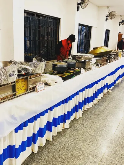 This is an example of a straightforward and clean buffet arrangement for an indoor event. No matter the scale, I ensure the setup is professional, hygienic, and well-organized.