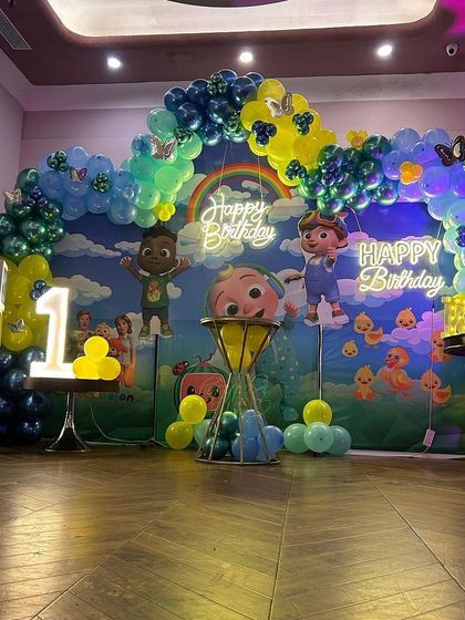 A wide shot of the Cocomelon birthday setup, demonstrating how it can transform a large space into a vibrant, themed party zone.