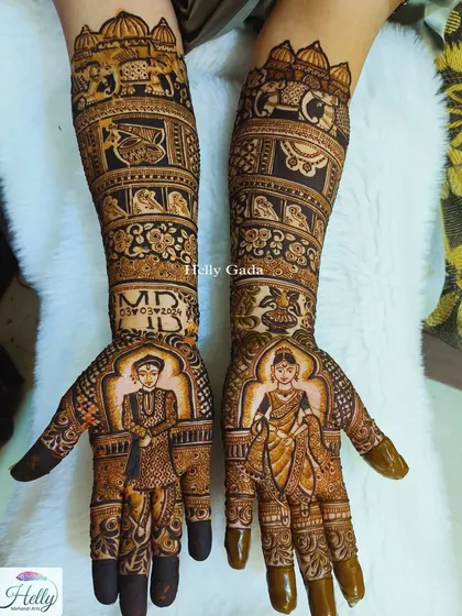 A full display of a Maharashtrian bridal design, with the groom on one hand and the bride on the other. The arms feature traditional motifs like elephants and palanquins, celebrating the culture.