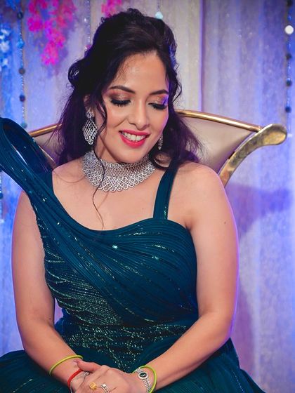 A close-up of this gorgeous engagement look. The soft, shimmery eyeshadow and bright pink lip created a fresh and celebratory feel that perfectly matched her smile.