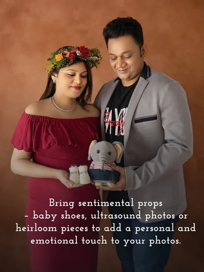 Adding sentimental props like tiny baby shoes makes a maternity photo even more special. It's a sweet nod to the little one you're so excited to meet.