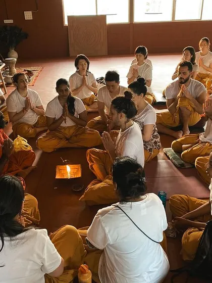 A fire ceremony is at the heart of our community gatherings. Students sit in a circle, chanting and making offerings, creating a powerful collective energy of prayer and intention.