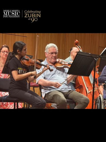 A student from our string ensemble plays alongside a member of the Belgrade Philharmonic, a perfect example of the mentorship and collaborative learning we facilitate.