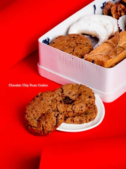 For a classic taste, I include Chocolate Chip Pecan Cookies, a buttery American favourite.