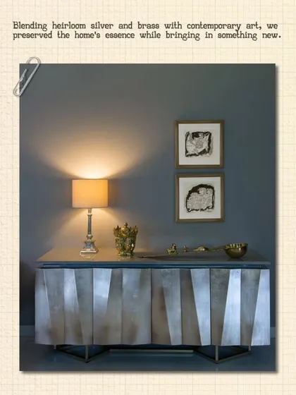 A custom silver-finished sideboard designed to blend heirloom silver and brass with contemporary art. This piece from the Bhasker Residence showcases our skill in creating bespoke furniture that honors a family's heritage.