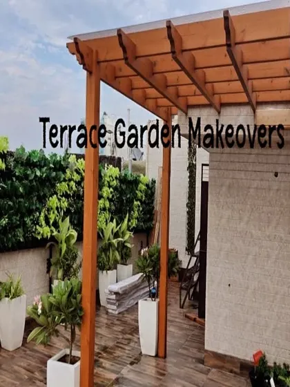 A classic wooden pergola with a transparent roof provides shelter from the rain without sacrificing sunlight. We paired it with an artificial leaf wall for privacy and greenery, creating a functional year-round space.