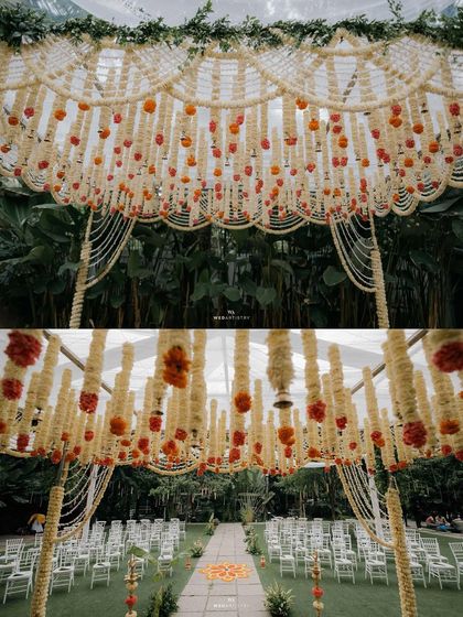 A duplicate of 235, offering another look at the stunning overhead floral installation that defined the wedding ceremony space.