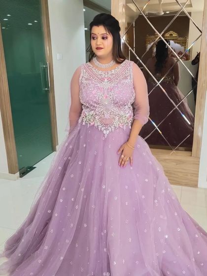 The client looks absolutely radiant in her full reception attire.