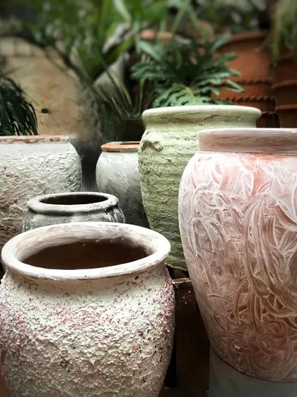 Where gardens find their artistic soul. A look at our latest range of designer terracotta pots, featuring unique textures and hand-carved details.