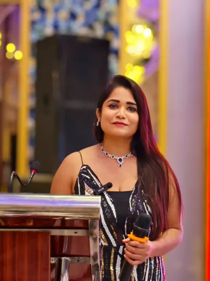 At the podium for the RP Group, ready to introduce the company's legacy and its leaders. I take the time to learn about your company to represent you authentically.