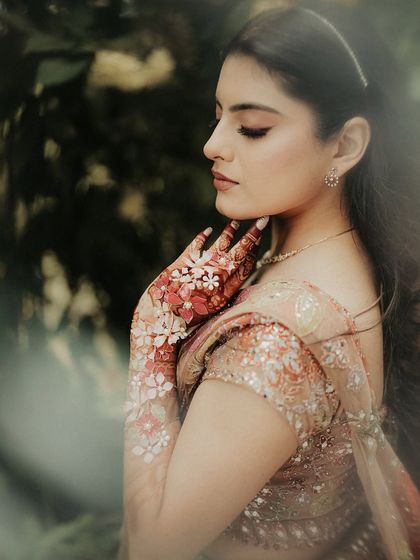 A portrait that is all about the details. I focused on the bride's stunning floral henna design, a beautiful and artistic element of her overall bridal look.