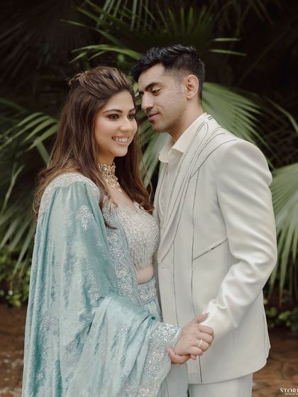 A close-up of the couple, their expressions full of love and admiration for each other.