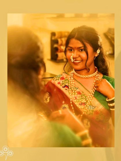 A happy client trying on a beautiful Motihaar and Nath in my studio.