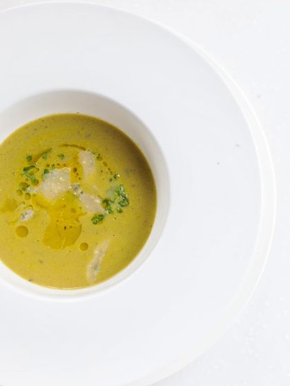 A smooth vegetable puree soup, elegantly finished with a drizzle of olive oil. Plating and presentation are key elements we teach.