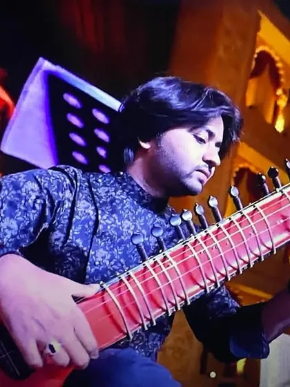 Here I am, lost in the music during a live performance in Ahmedabad with my electric zitar. Capturing the energy of a live show is an experience like no other.
