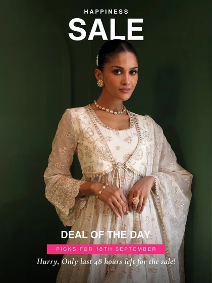 A classic white anarkali is a must have in any ethnic wardrobe. This one, with its delicate tie front detail, is a top deal of the day. Only 48 hours left to shop.