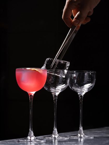 We reimagine the classic daiquiri with the floral essence of marigold. This bright, citrus-forward cocktail is infused with the golden warmth of the flower, creating a drink that feels like sunshine in a glass.