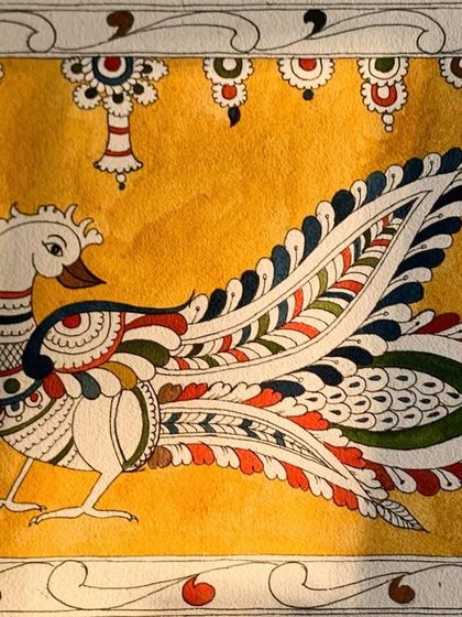 A student's mesmerizing Kalamkari peacock, rich in detail and color. This piece is a testament to the 23-step authentic process we teach, honoring the heritage of this art form.