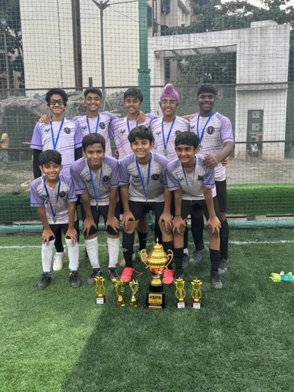 Our U-15 squad with their runner-up trophy and individual awards from the Prodigy Premiere League. We celebrate both team success and personal achievements.