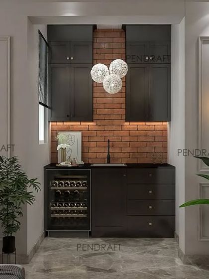 A compact bar and pantry unit is seamlessly integrated into the living room. The design uses an exposed brick wall and dark cabinetry to create a rustic yet chic corner.