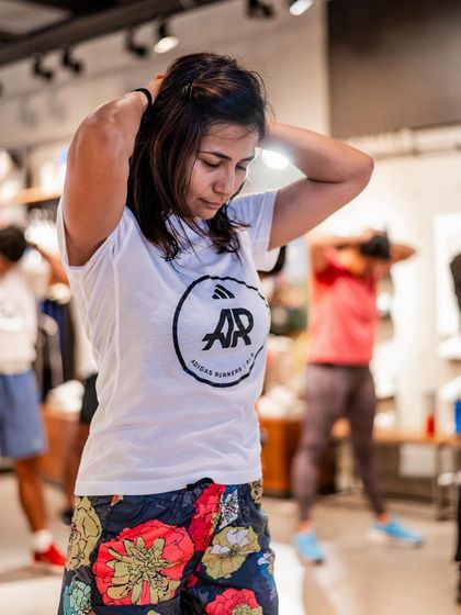 A duplicate of image 42. Focused during a group workout session.