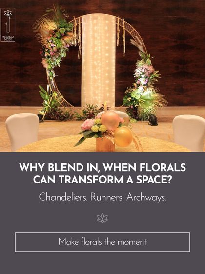 Why blend in when florals can transform a space? This circular archway, adorned with flowers and lights, becomes the focal point of the room. You will learn how to create statement pieces like chandeliers, runners, and archways.