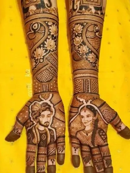 A detailed portrait design showing the bride and groom. I take great care to capture likeness and expression, making your portrait mehndi a true centerpiece.