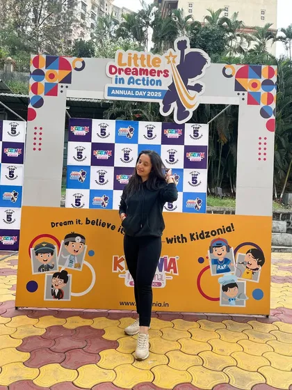 Posing at the photo booth after the 'Little Dreamers in Action' annual day event. It was wonderful to see the kids perform with so much confidence.