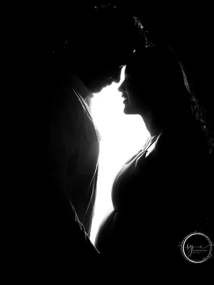 Sometimes, the most powerful stories are told in silhouette. This artistic maternity portrait focuses on the beautiful shape of new life and the intimate connection between the expecting parents, creating a timeless and dramatic image.