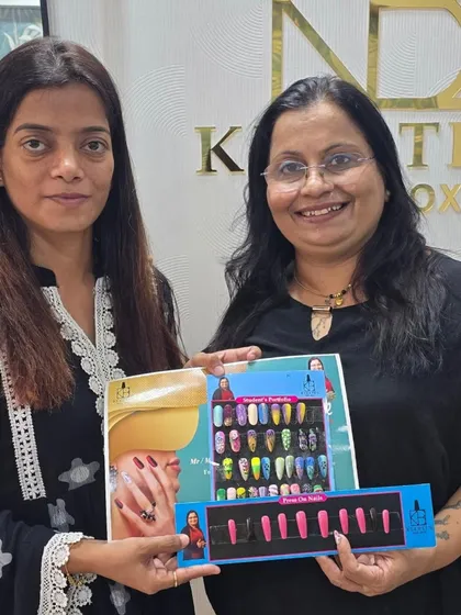 A proud moment with my student Pallavi as she graduates from the Professional Nail course. This certificate is not just a piece of paper; it's the beginning of her entrepreneurial journey, and I'm here to support her all the way.