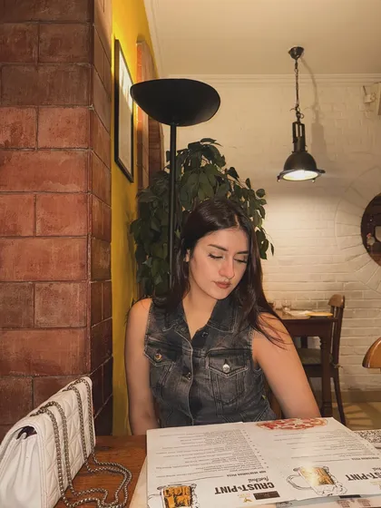 Contemplating the menu, still in my casual denim look.