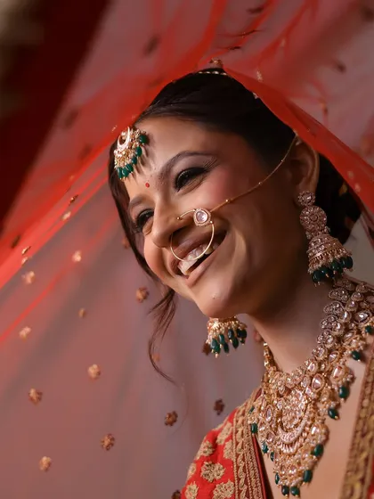 The pure joy of a bride on her wedding day. This candid smile shows how confident and beautiful my clients feel, with makeup that enhances their natural happiness.