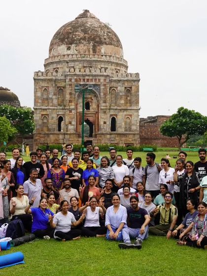 A large group photo of our entire community at the Lodhi Garden picnic. It's a beautiful memory of a day filled with wellness and togetherness.