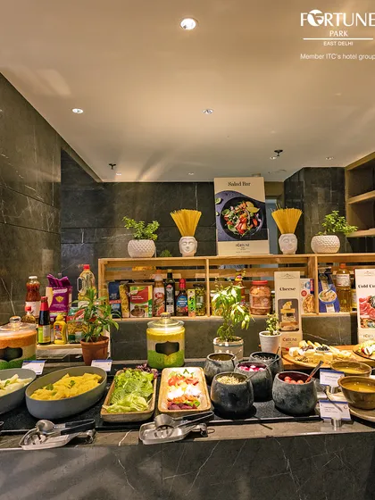 Another view of our vibrant salad bar, featuring a wide range of fresh ingredients and condiments.