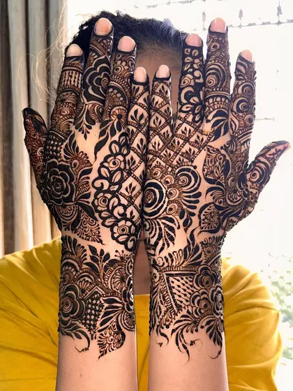 A stunning full-coverage design with bold, dark florals that create a powerful visual impact.