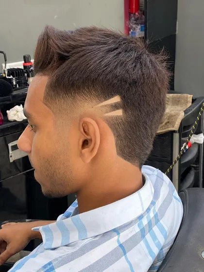 Another angle of the double-line design, showcasing how it complements the spiky, textured hair on top.