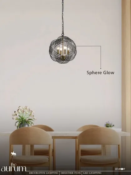 The 'Sphere Glow' pendant, with its woven metal design, casts beautiful, intricate shadows. I love using fixtures like this to add texture and a layer of visual interest to a minimalist dining space.