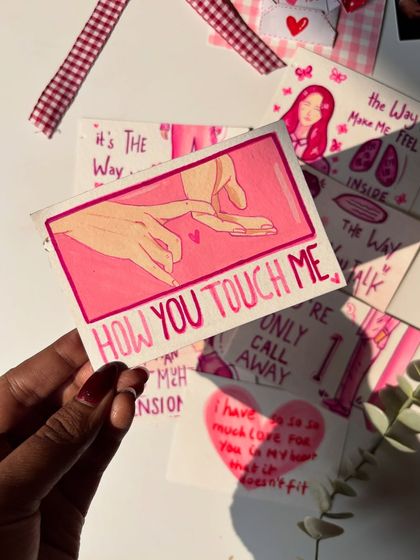 This page says "How You Touch Me," with a delicate drawing of two hands. The whole book follows this romantic, pink aesthetic.