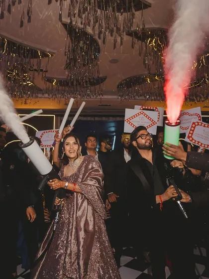 After the wedding comes the after-party. For this couple, we planned a masquerade night where they made a grand entrance with CO2 guns, kicking off an unforgettable night of mystery and music.